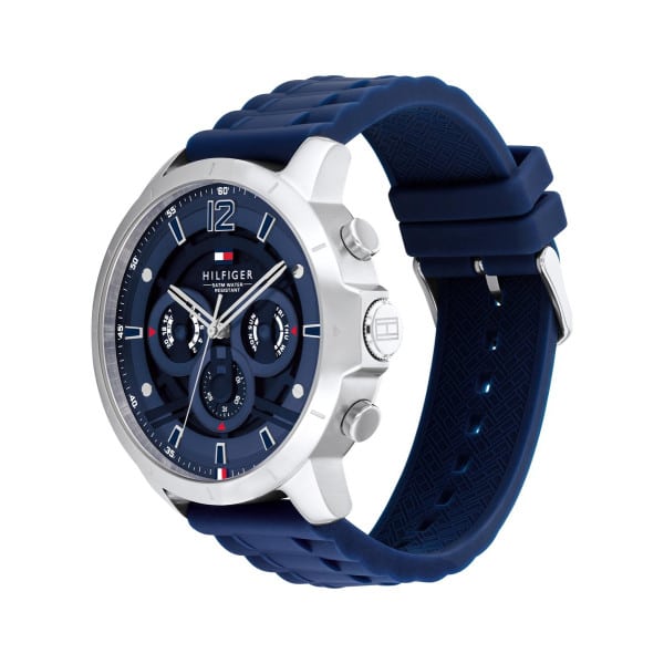 Angled real-life photo of Tommy Hilfiger 1710489 showing the silver case and rubber texture