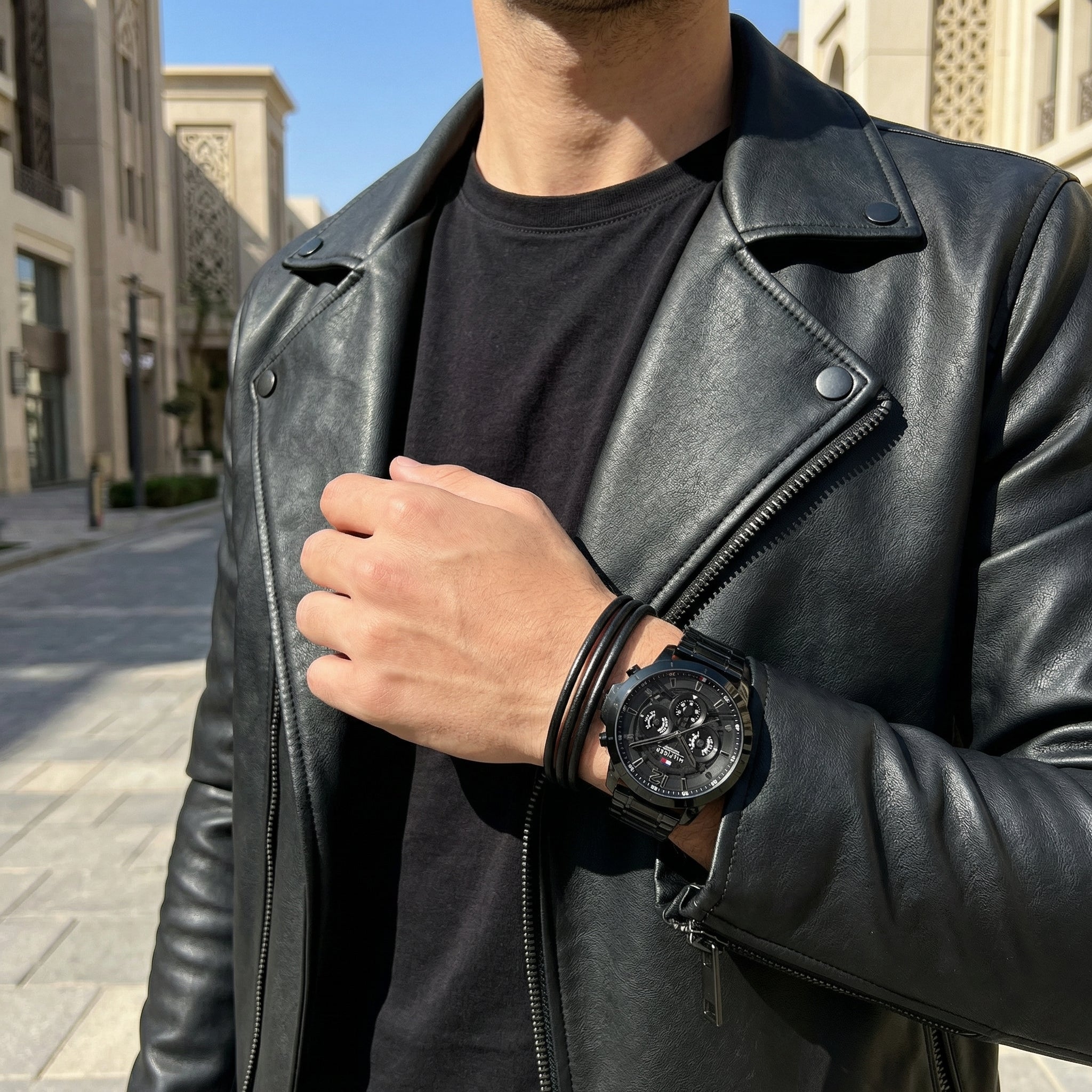 Lifestyle photo of Tommy Hilfiger 1710494 showing the watch on a man's wrist with black steel bracelet