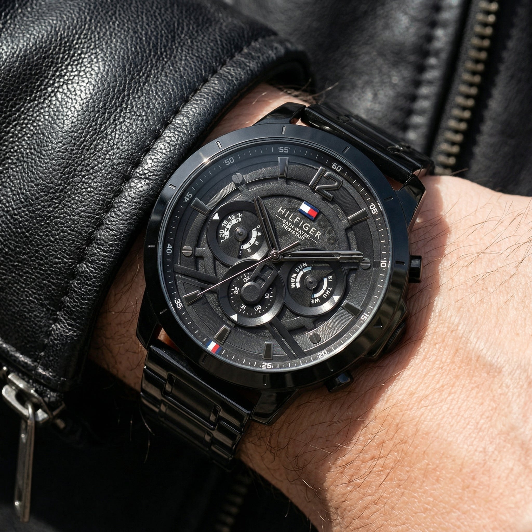 Close up shot of Tommy Hilfiger 1710494 on wrist showing black dial and sub-dial counters