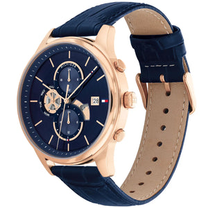 Angled real-life photo of Tommy Hilfiger 1710503 showing the rose gold case and leather texture