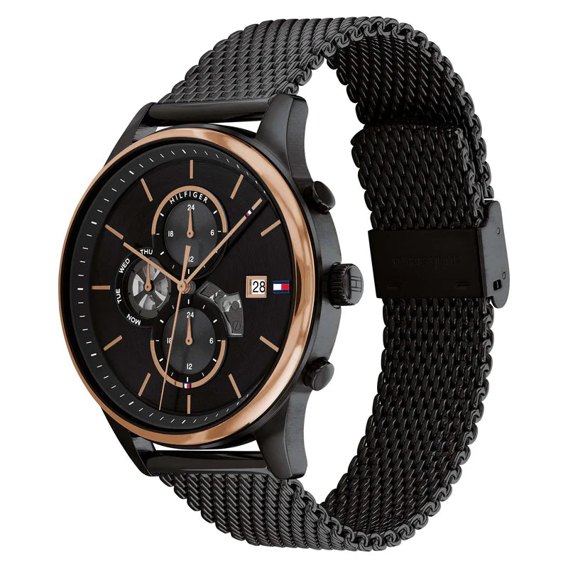 Angled real-life photo of Tommy Hilfiger 1710505 showing the black case and mesh texture