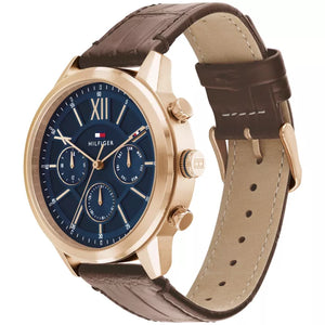 Left angled view of Tommy Hilfiger Morrison 1710526 men's quartz battery watch showing brown leather strap and gold-tone case profile