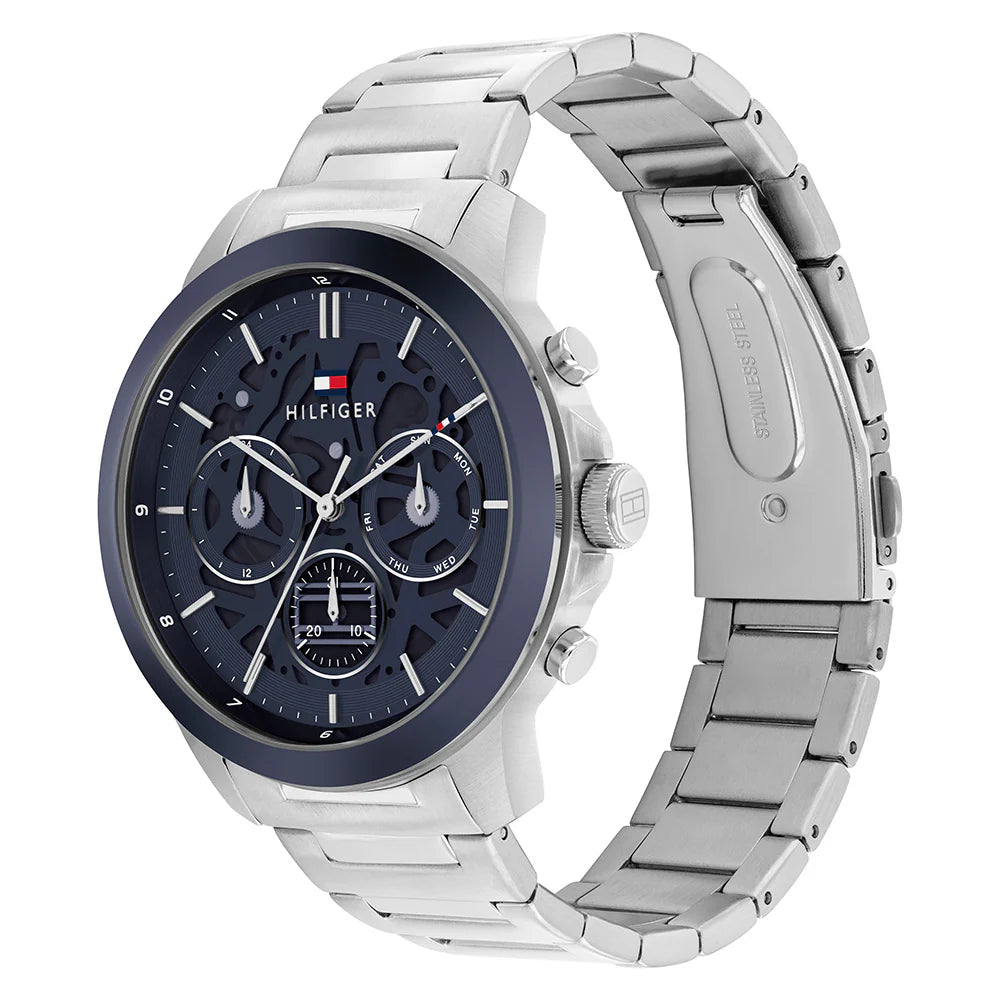 Left angled view of Tommy Hilfiger Henry 1710684 men's quartz battery watch showing silver stainless steel bracelet and case profile