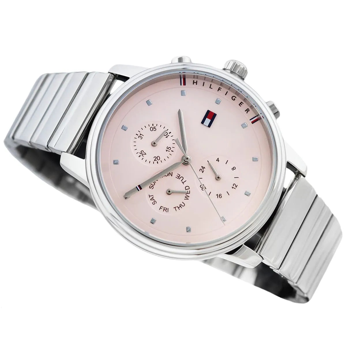 Angled real-life photo of Tommy Hilfiger 1781904 showing the polished silver case and sunray dial