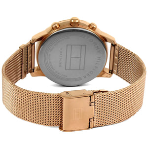 Caseback of Tommy Hilfiger 1781907 women's quartz battery watch showing technical specs rose gold dial and mesh bracelet