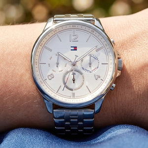 Close up shot of Tommy Hilfiger 1782222 on wrist showing white dial and rose gold-tone hands
