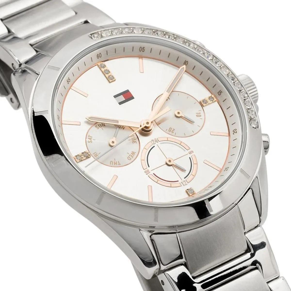 Detailed side view of the silver-tone crown and the sparkling crystal accents on the bezel of the 1782384