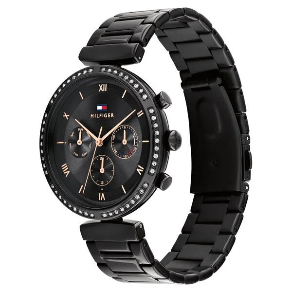 Angled real-life photo of Tommy Hilfiger 1782390 showing the polished black case and crystal detail