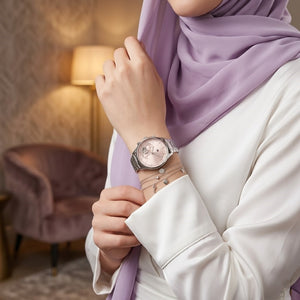 Lifestyle photo of Tommy Hilfiger 1782414 showing the elegant silver watch on a woman's wrist