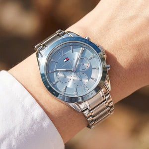 Close up shot of Tommy Hilfiger 1782554 on wrist showing crystal markers and light blue bezel