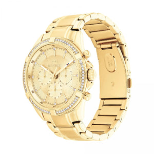 Angled real-life photo of Tommy Hilfiger 1782556 showing the polished gold case and crystal detail