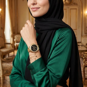 Lifestyle photo of Tommy Hilfiger 1782570 showing the glamorous gold watch on a woman's wrist