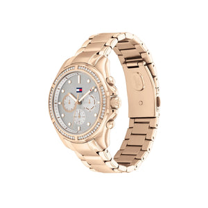 Angled real-life photo of Tommy Hilfiger 1782572 showing the polished rose gold case and silver dial