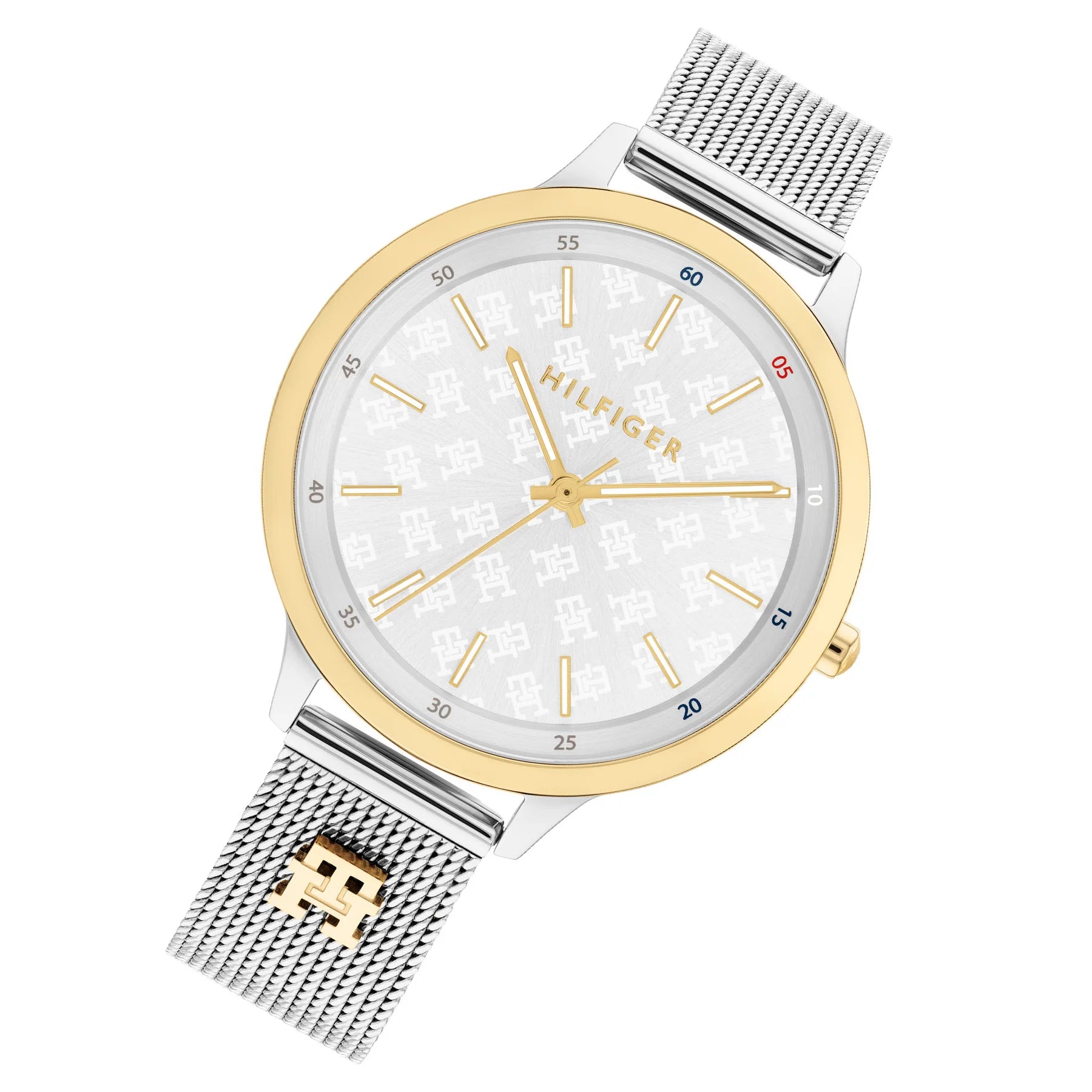 Right angled view of Tommy Hilfiger 1782586 women's quartz battery watch highlighting gold bezel and silver mesh finish
