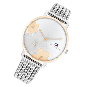 Left angled view of Tommy Hilfiger 1782604 women's quartz battery watch showing silver mesh strap and rose gold-tone bezel profile