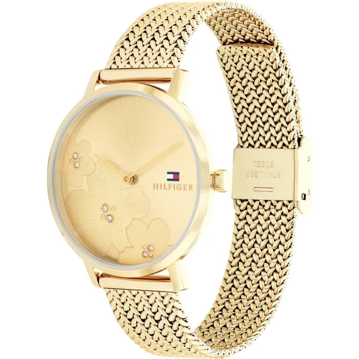 Right angled view of Tommy Hilfiger 1782606 women's quartz battery watch highlighting full gold finish and slim profile details