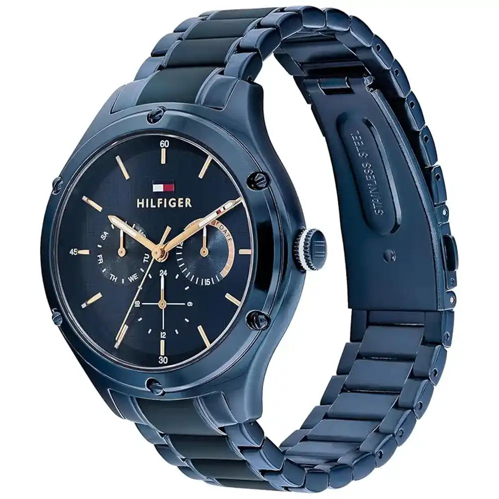 Angled real-life photo of Tommy Hilfiger 1782656 showing the polished navy case and textured dial