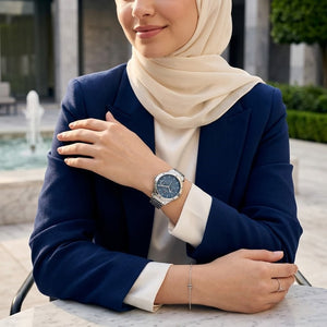 Lifestyle photo of Tommy Hilfiger 1782657 showing the elegant silver watch on a woman's wrist