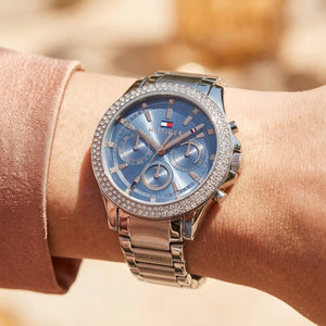 Close up shot of Tommy Hilfiger 1782690 on wrist showing crystal bezel and rose gold-tone hands