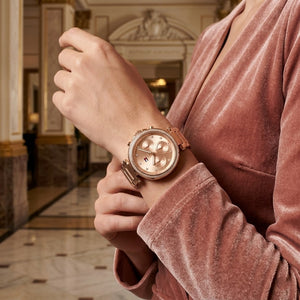 Lifestyle photo of Tommy Hilfiger 1782705 showing the elegant rose gold watch on a woman's wrist