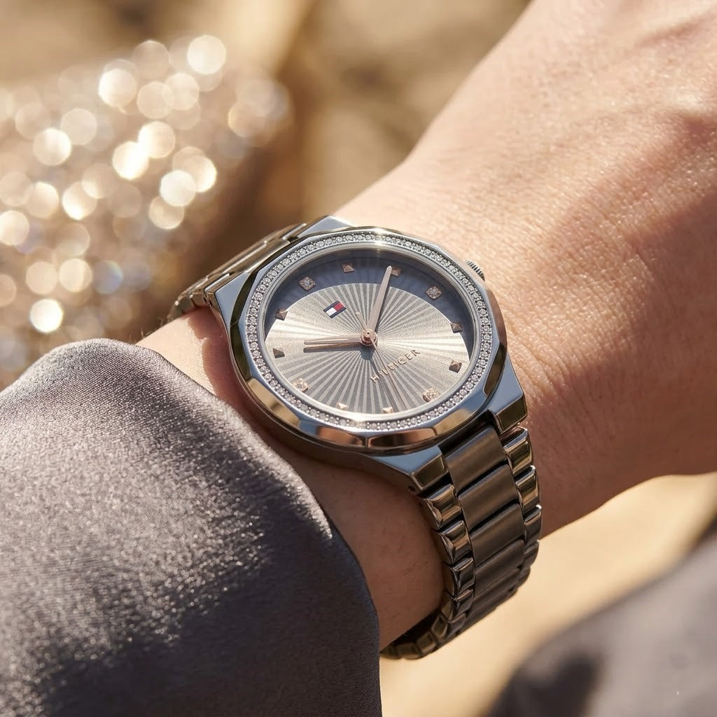 Close up shot of Tommy Hilfiger 1782727 on wrist showing grey sunray dial and rose gold-tone hands