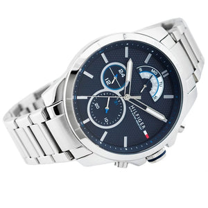 Side profile of Tommy Hilfiger Decker 1791348 men's quartz battery watch showing 12mm thickness and silver finish