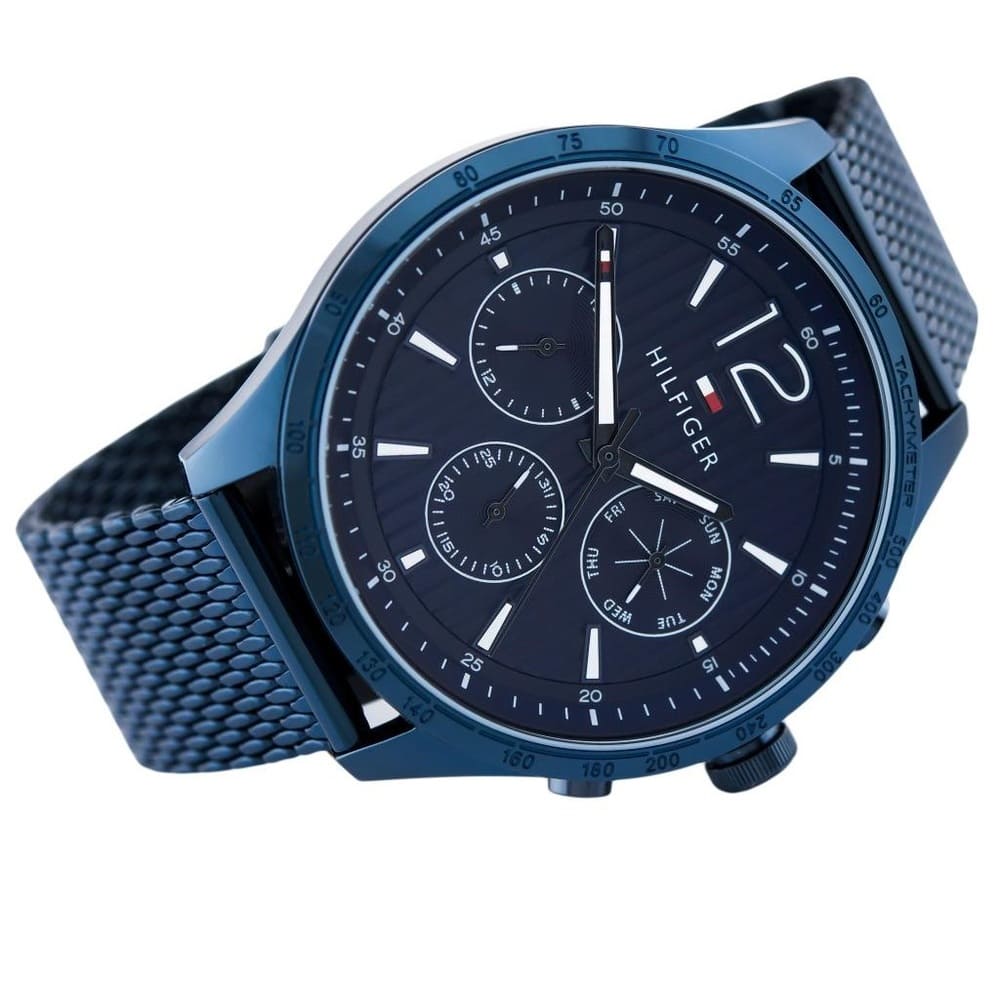 Right angled view of Tommy Hilfiger Gavin 1791471 men's quartz battery watch highlighting blue finish and tachymeter details