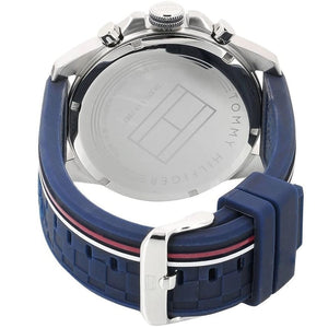 Caseback of Tommy Hilfiger Decker 1791476 men's quartz battery watch showing technical specs blue dial and rubber strap