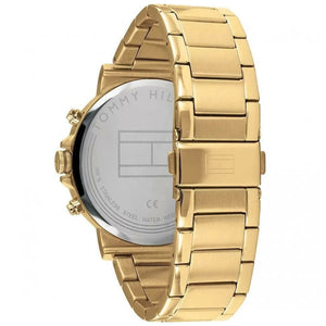 Caseback of Tommy Hilfiger Decker 1791538 men's quartz battery watch showing technical specs white dial and gold metal bracelet