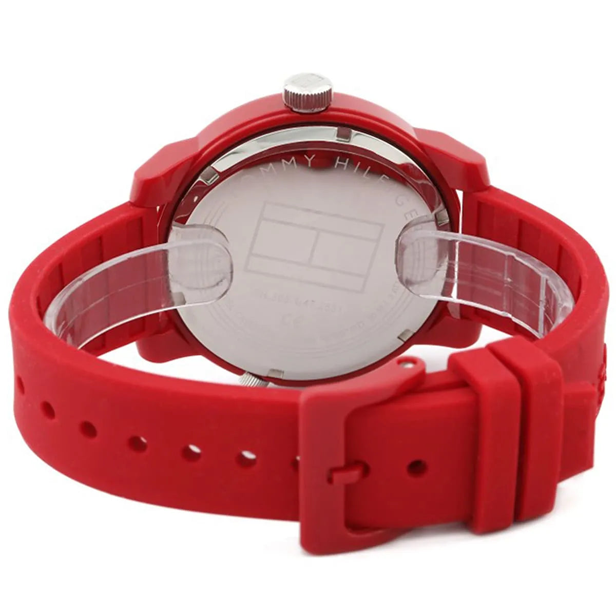 Caseback of Tommy Hilfiger Denim 1791557 men's quartz battery watch showing technical specs red dial and rubber strap