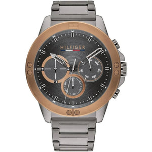 Tommy Hilfiger Harley 1791892 men's watch featuring a gunmetal grey stainless steel case, gold-tone bezel, multi-function dial, and link bracelet