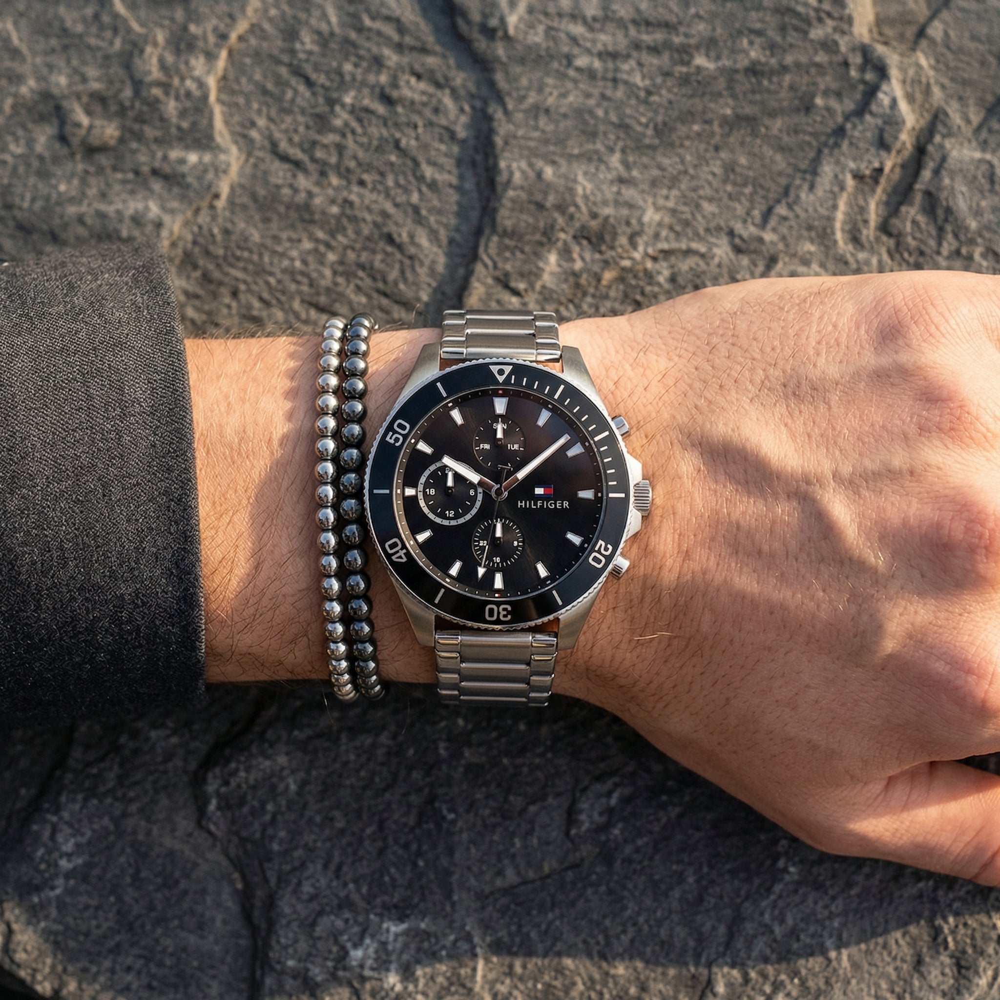 Close up shot of Tommy Hilfiger 1791916 on wrist showing black dial and sub-dial counters
