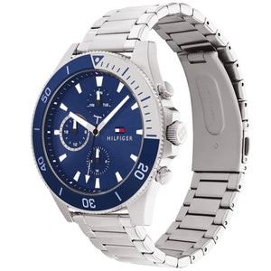 Angled real-life photo of Tommy Hilfiger 1791917 showing the silver case and blue bezel