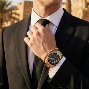 Lifestyle photo of Tommy Hilfiger 1791919 showing the watch on a man's wrist with gold bracelet