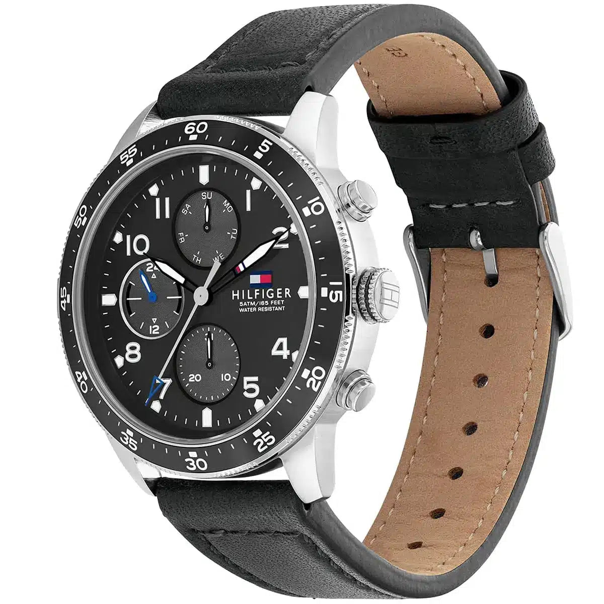 Angled real-life photo of Tommy Hilfiger 1791947 showing the polished case and leather strap
