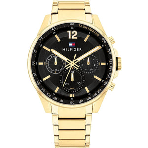 Tommy Hilfiger Damon 1791974 men's watch featuring a gold-tone stainless steel case, black multi-function dial, and gold link bracelet