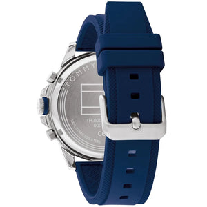 Photo of the silver stainless steel buckle on the blue rubber strap of Tommy Hilfiger 1792027