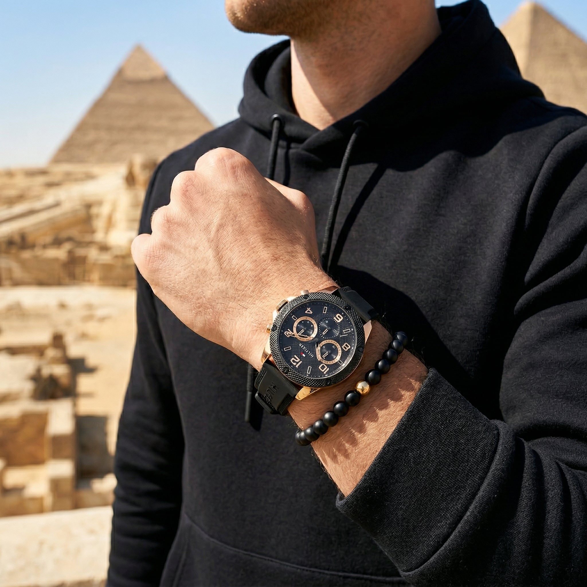 Lifestyle photo of Tommy Hilfiger 1792028 showing the watch on a man's wrist with sporty black strap