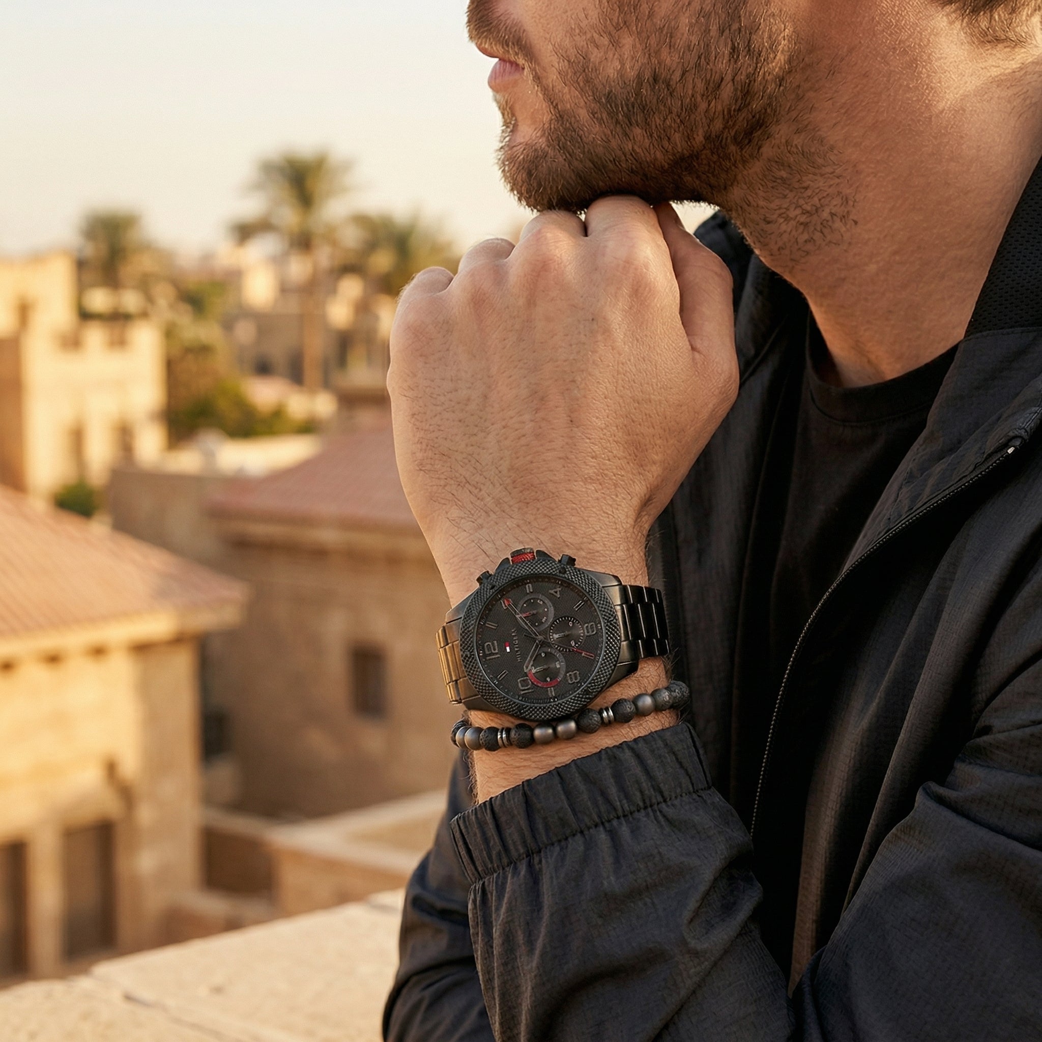 Lifestyle photo of Tommy Hilfiger 1792030 showing the watch on a man's wrist with black steel bracelet