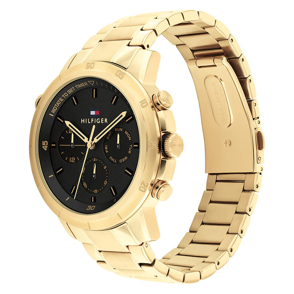Angled real-life photo of Tommy Hilfiger 1792109 showing the gold case and metal strap