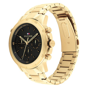 Angled real-life photo of Tommy Hilfiger 1792109 showing the gold case and metal strap