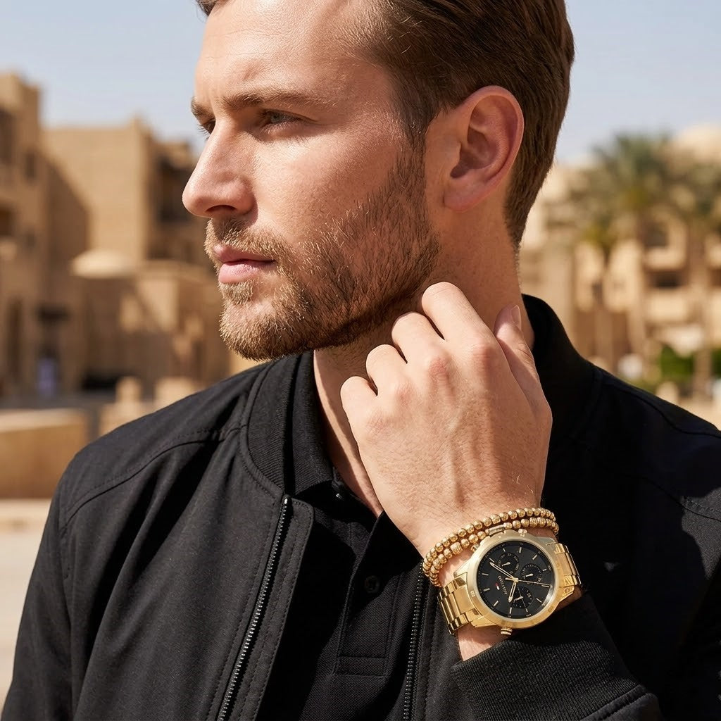 Lifestyle photo of Tommy Hilfiger 1792109 showing the watch on a man's wrist with accessories