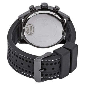 5. Detailed view of the black pin buckle on the perforated rubber strap of Guess W0971G1