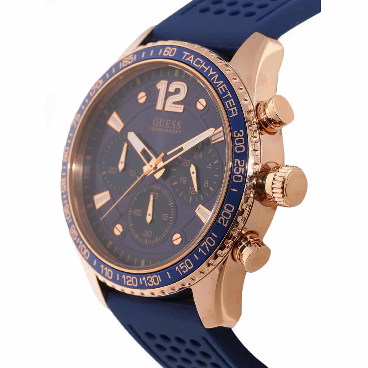 5. Left side perspective of the Guess W0971G3 highlighting the perforated blue rubber strap