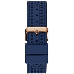8. Rose gold pin buckle on the blue rubber strap of the Guess W0971G3