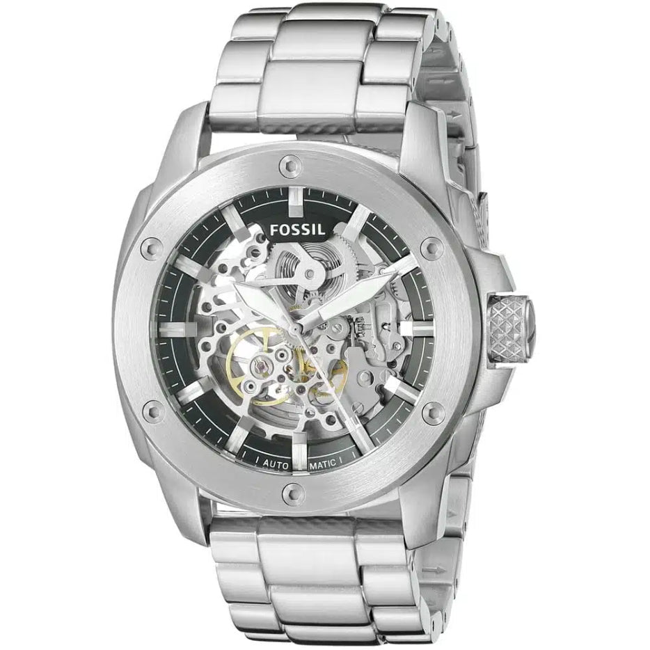 Silver Fossil watch with visible mechanical components on a white background