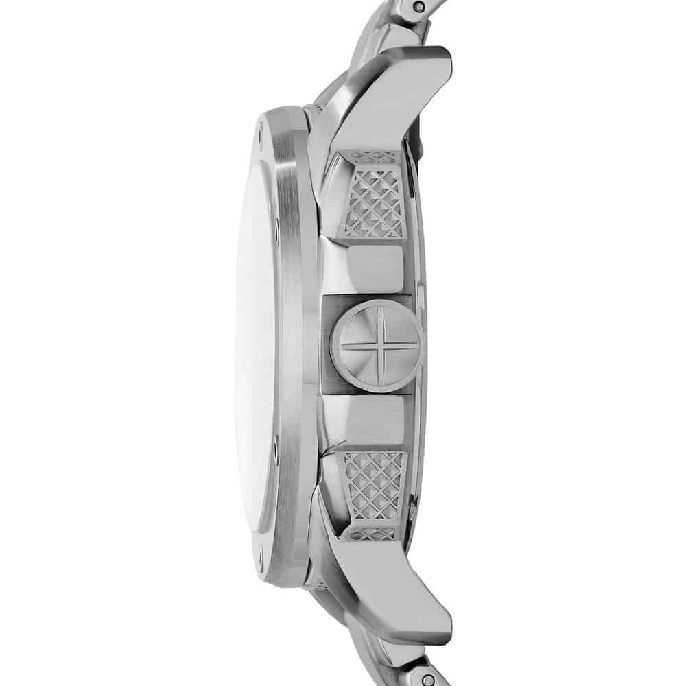 Close-up side profile of a stainless steel watch with a textured bezel, crown, and matching metal bracelet on a white background.