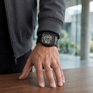 Front view of Fossil Inscription BQ2574 men's automatic skeleton watch with black stainless steel bracelet