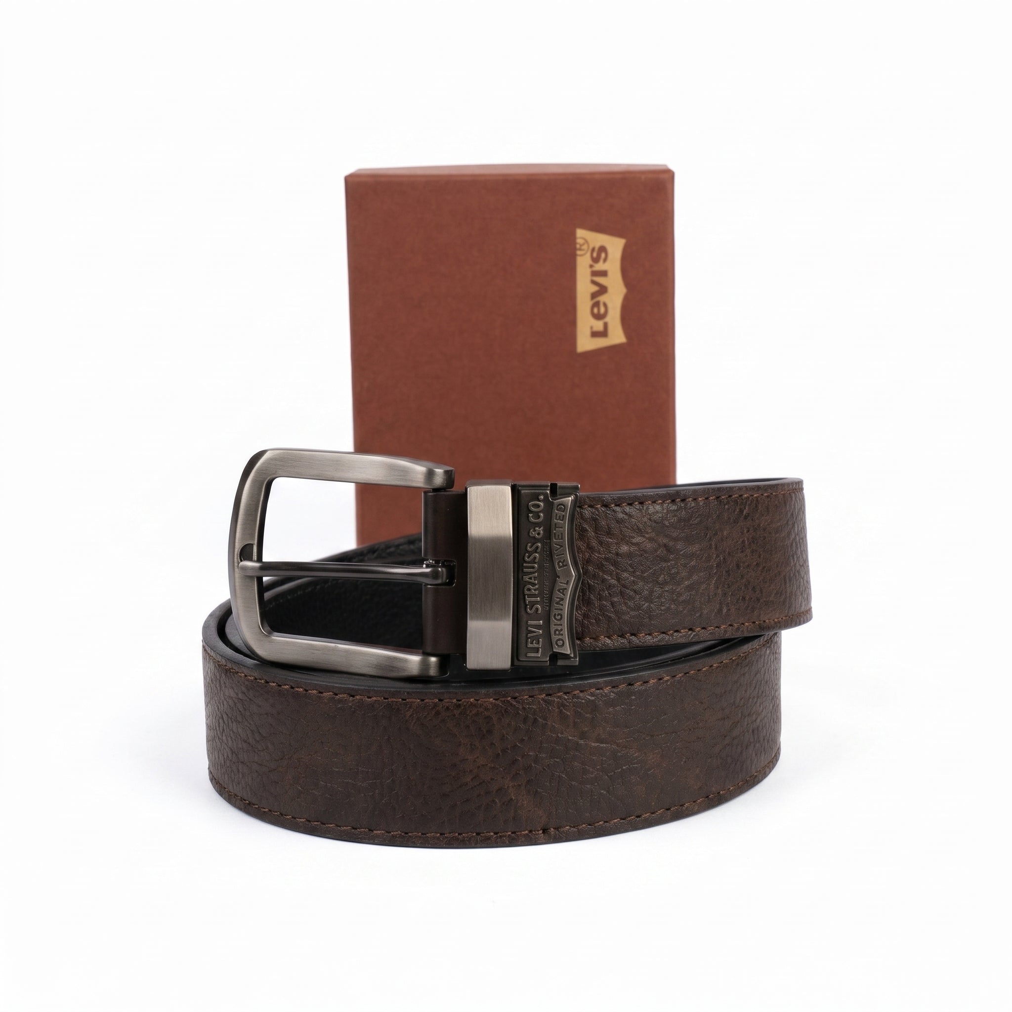 Brown leather belt with silver buckle in front of a Levi's branded box on a white background
