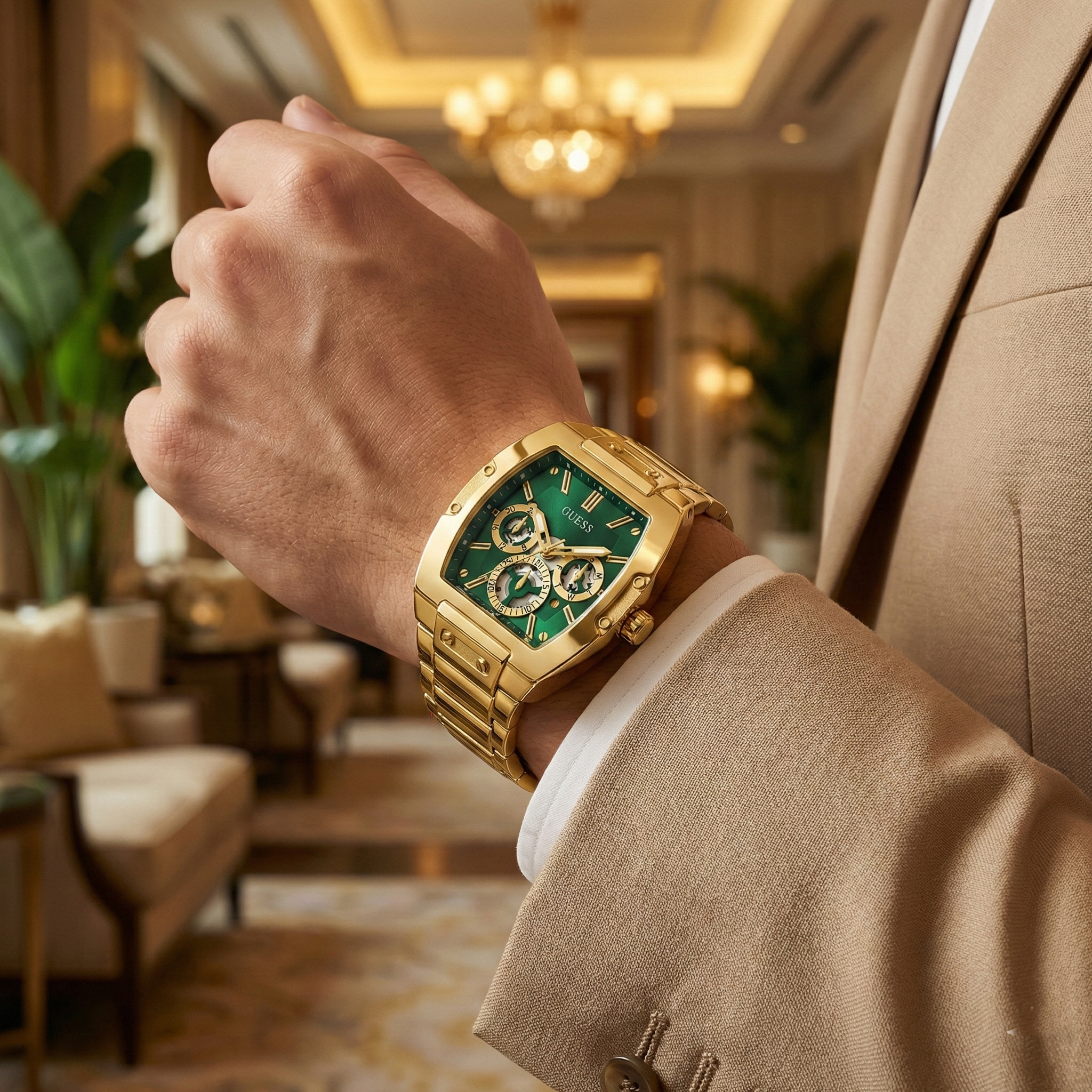 AI lifestyle shot of a man wearing the gold and green Guess Phoenix watch